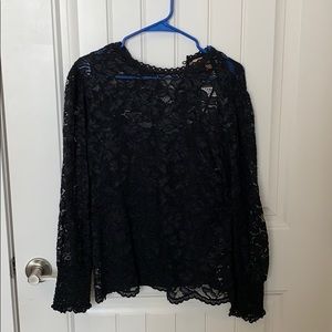Black colored lace blouse with lining